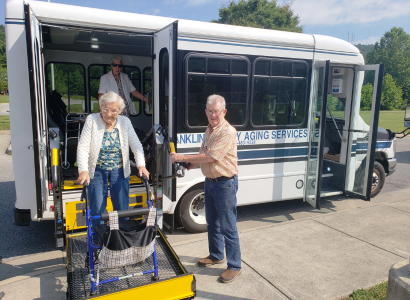 Woman Using Bus Lift